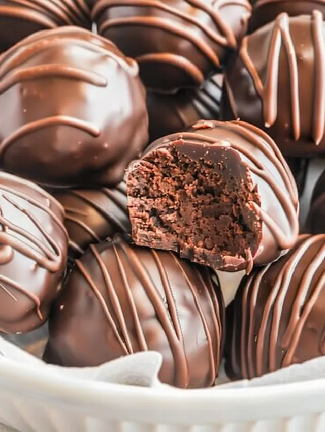 A close up of a brownie truffle.