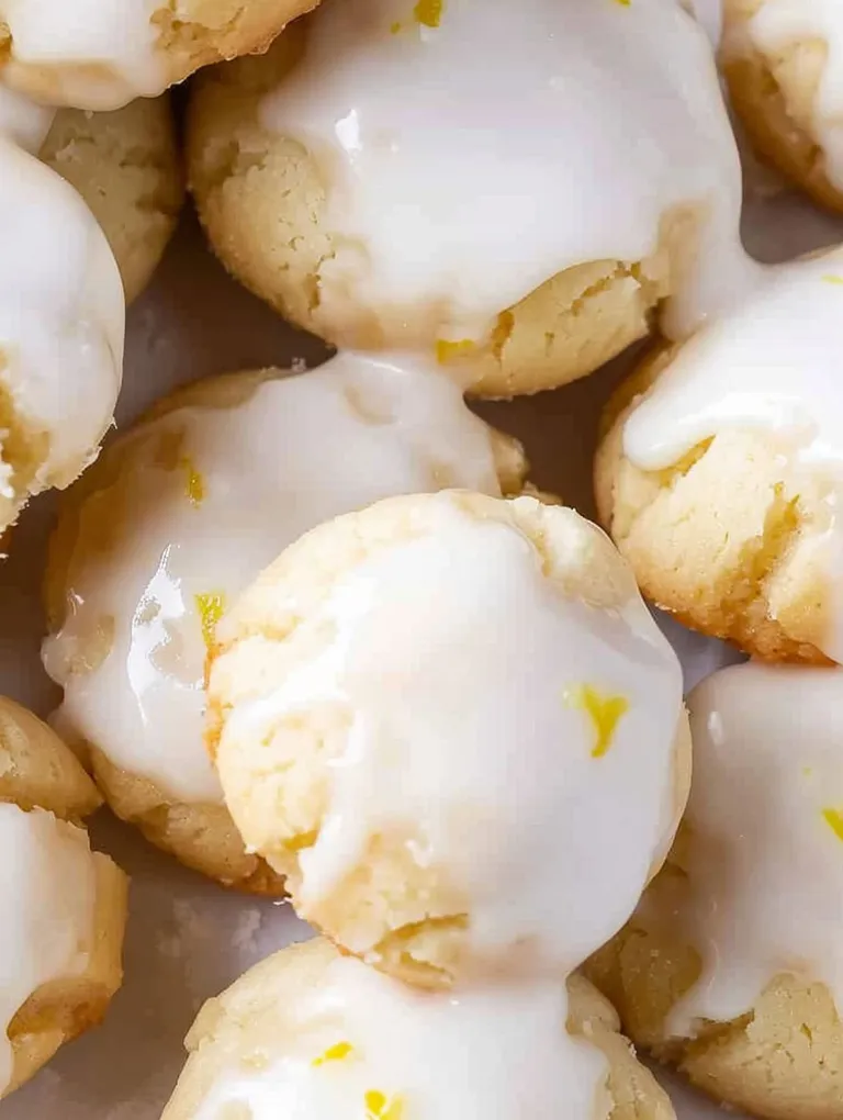 A plate of glazed lemon drop cookies.