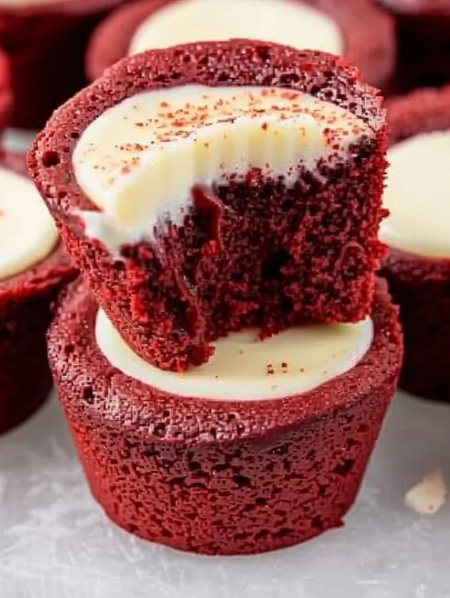 Red velvet cheesecake bites with white icing.