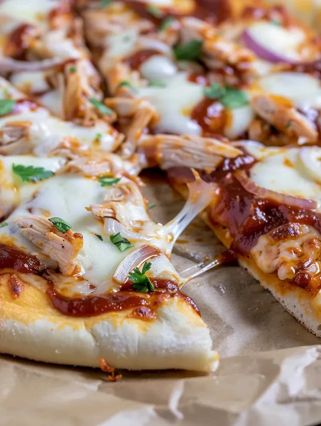 A slice of BBQ chicken pizza.